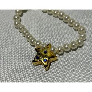 Pearl Beaded necklace with Gold‎ tone Star Pendant and Blue Rhinestones